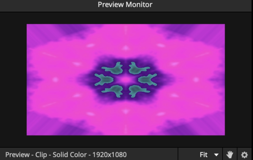 Resolume's Preview Monitor showing a magenta and cyan R3NE kaleidoscope rendered by the plugin